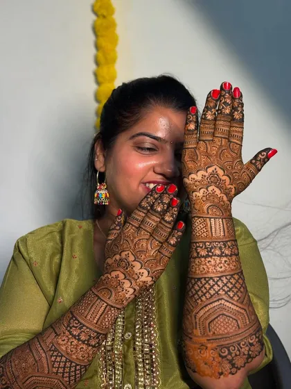 Another beautiful photo of my friend and her bridal mehendi. The joy on her face is what makes my work so fulfilling.