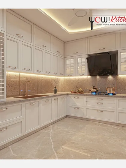 Another perspective of the timeless white kitchen, showcasing the ample storage and the warm glow of the under-cabinet lighting on the textured backsplash.