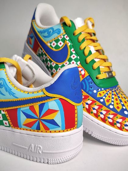 A detail shot of the heel and side panel of the Indian-inspired AF1s. The geometric and floral motifs blend together to create a vibrant, cohesive design.