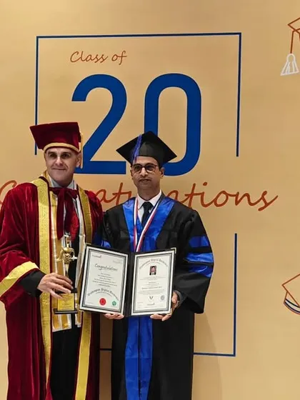 Our leadership's expertise is at the core of our educational quality. Here, our founder, Vinit Kumar, is seen receiving an Honorary Doctorate Degree from Washington Digital University, USA, for his exceptional contributions to the arts.
