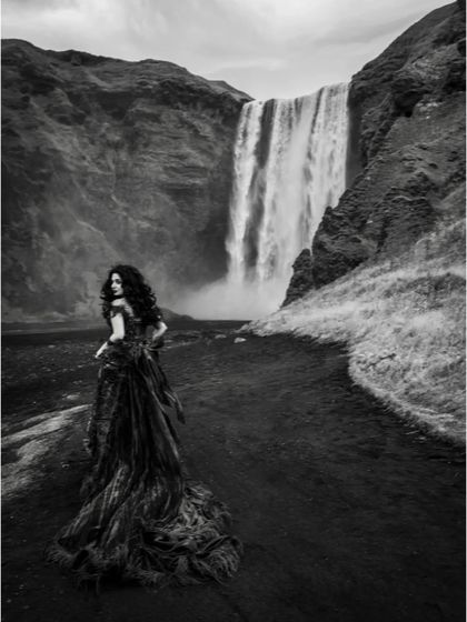 Another dramatic black and white shot. This perspective highlights the incredible train and the wild, untamed feeling of the location, proving that the right outfit can make any backdrop epic.