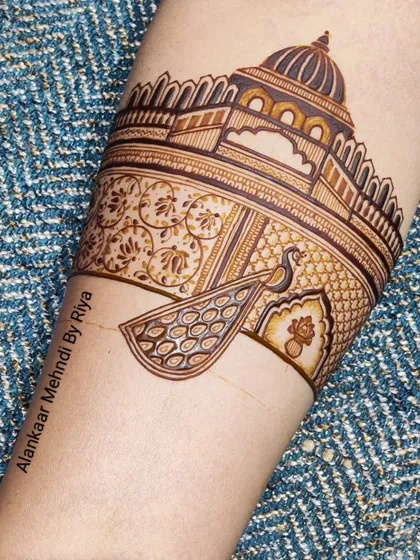 The palace arm band with a peacock motif added, and the initial layers of shading applied.