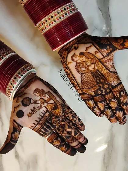 A beautiful Karwa Chauth special design. The hands showcase a romantic couple portrait and a traditional figure of a woman, complemented by the bridal chooda.