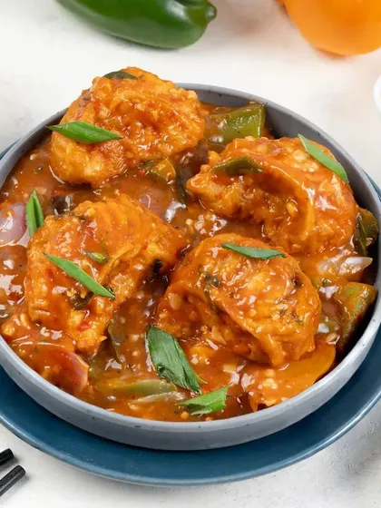 Gravy momos are a crowd favorite. We focused on the rich, glossy texture of the gravy and the plumpness of the momos to create a truly drool-worthy image.