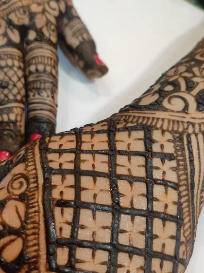 A macro shot of the checkered pattern, showing the precision and control needed for clean gridwork.