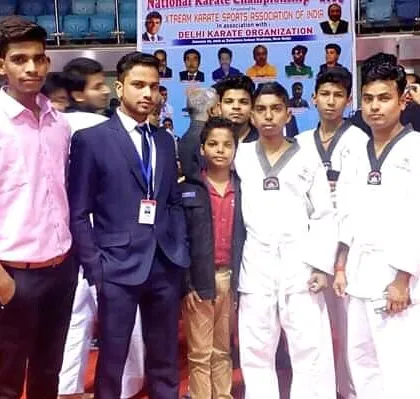 A photo session with our students and instructors after a victorious day at the competition.