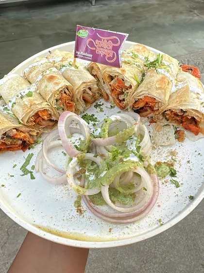 A full platter of our famous Chaap Rolls. These are perfect for a party or a satisfying snack, filled with spicy tandoori chaap and sauces.