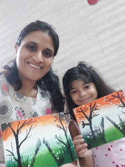 A beautiful moment from a mother-daughter painting session. Creating art together is a fantastic way to bond and make lasting memories.