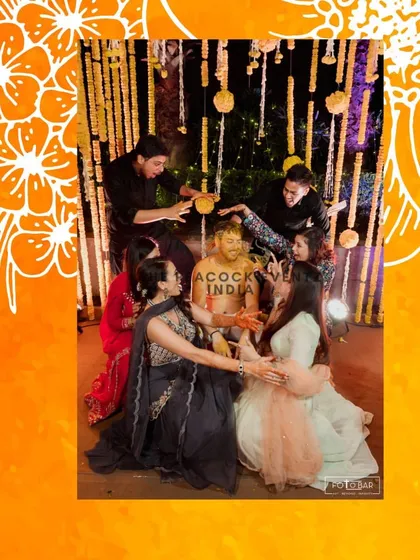 Capturing the fun and heartwarming moments of the Haldi ritual. The groom is surrounded by family and friends, with the traditional marigold decor I designed serving as a beautiful backdrop.