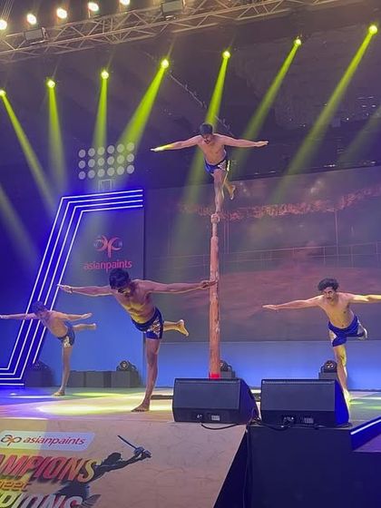 A powerful group pose from our performance at the ICC World Cup event. The coordination and strength required for these human pyramids demonstrate the high level of skill our artists possess.