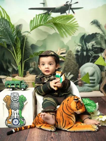 A curious look from our little soldier, holding two small flags. The details in the background, like the airplane, add to the story.