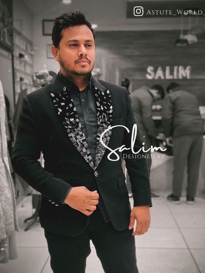 A client in a black blazer with a textured, geometric lapel. This is a great option for someone who wants a modern look without overt sparkle.