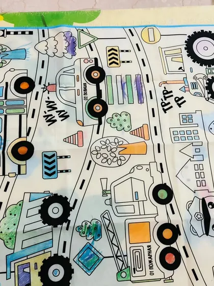 A partially colored mat, showing the fun in progress. The large size allows for hours of creative fun, and it's easy to store away.