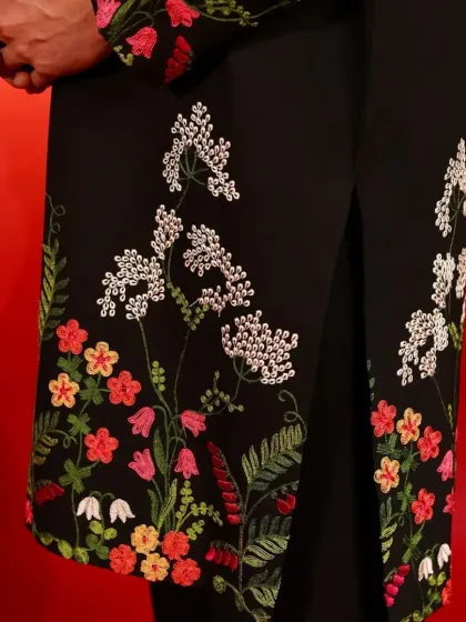 A close-up of the beautiful and colorful floral embroidery.