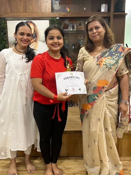 A student from the winning team receives her certificate. It's wonderful to see the joy and sense of accomplishment our events bring.