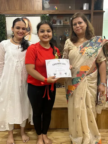 A student from the winning team receives her certificate. It's wonderful to see the joy and sense of accomplishment our events bring.