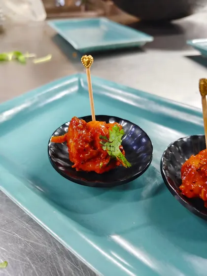 The art of indulgence, one skewer at a time. These spicy chicken bites are perfect for mingling, offering a burst of flavor on a convenient skewer.