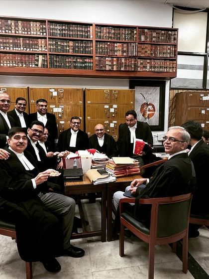 Another view of the popcorn celebration with fellow advocates. The bar room is a hub for both serious legal discussion and friendly interaction.