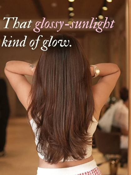 That glossy-sunlight kind of glow. This shot perfectly captures the healthy shine of a fresh color and style.