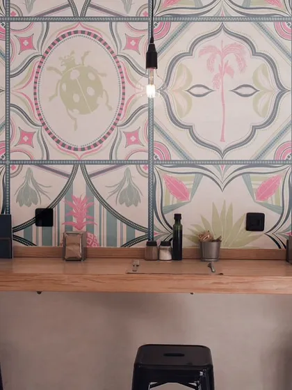 This mockup shows how my 'Tropical Tapestry' design can transform a commercial space like a cafe or boutique. The repeating tile pattern adds a vibrant, artistic backdrop that makes the environment feel custom and memorable.