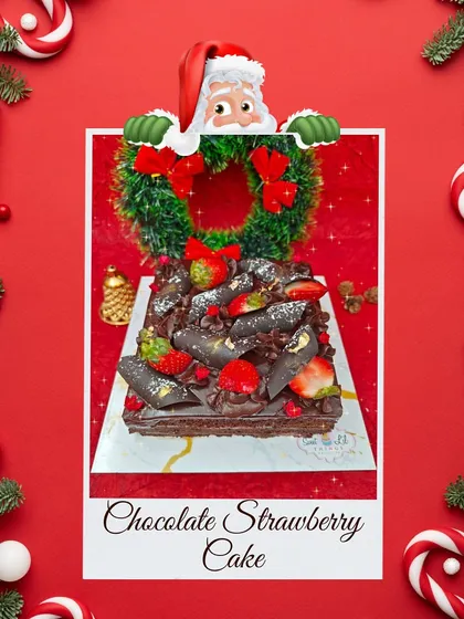 A decadent Chocolate Strawberry Cake for Christmas, featuring rich chocolate and fresh strawberries, topped with a festive wreath.