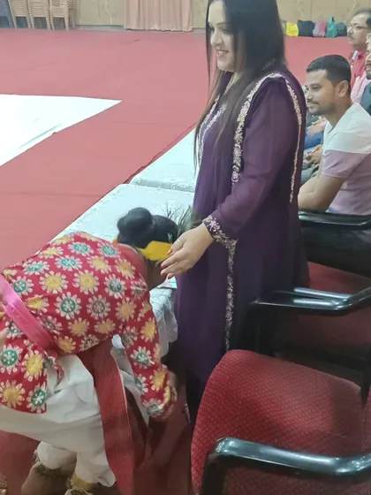 A moment of respect and tradition, as a young performer seeks blessings. Being part of these events as judges is a true privilege.