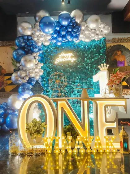 The full blue and silver sequin wall setup, perfect for a glamorous and modern celebration.