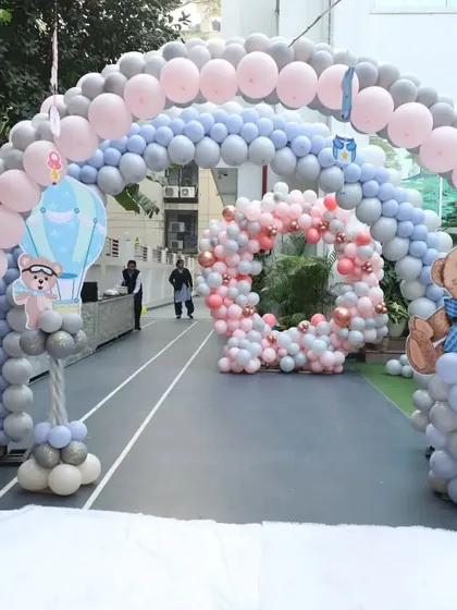 A grand entrance for a teddy bear themed party, with a massive balloon arch welcoming guests into our outdoor celebration area.