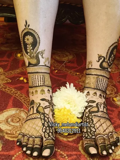 Your bridal look is complete only when your feet are adorned with beautiful mehndi. I design intricate patterns for the feet and legs, featuring traditional motifs like peacocks and paisleys that look stunning.