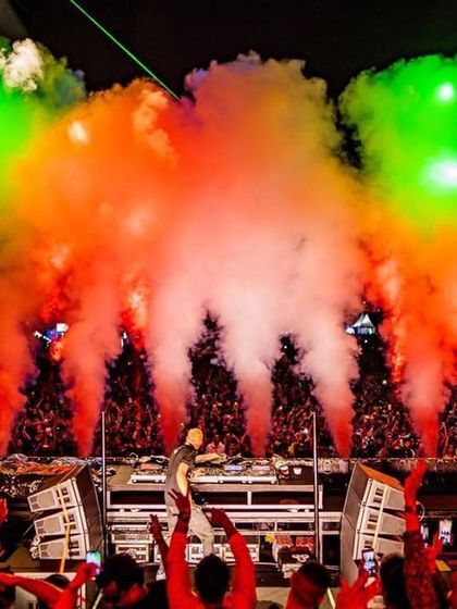A stunning shot of the stage bathed in the colors of the Indian flag, created with colored smoke during Boris Brejcha's set.
