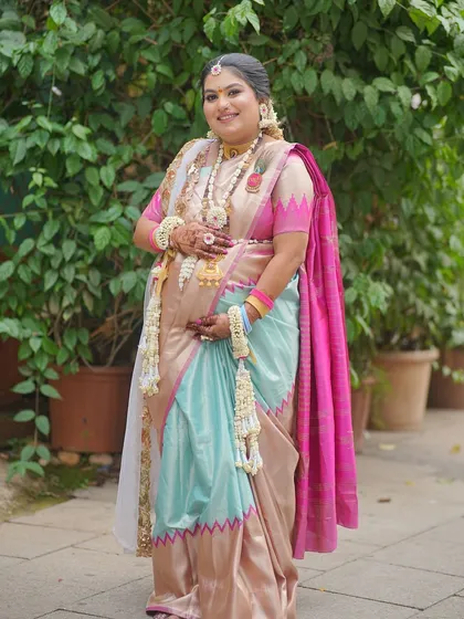 A beautiful portrait of a mom-to-be in her custom floral jewellery. The set is made from delicate white flowers, perfect for a serene and classic look.