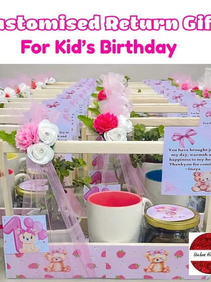 A full view of the "Customised Return Gifts For Kid's Birthday" in the pink teddy bear theme.