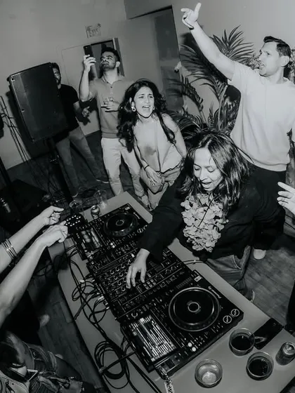 The energy at my first Canadian Lush Loft party in Toronto was electric. This shot captures that perfect moment of connection between me and the dancefloor. It’s all about creating that intimate, grassroots rager where everyone feels the music together.