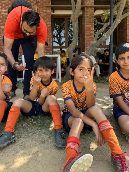 Meet the new champions. Relaxing after a game and enjoying the moment with their teammates.