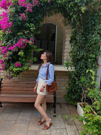 Lost in the beautiful lanes of Bangalore. For a day of exploring, I wore a simple blue shirt with a white skort and comfortable sandals.