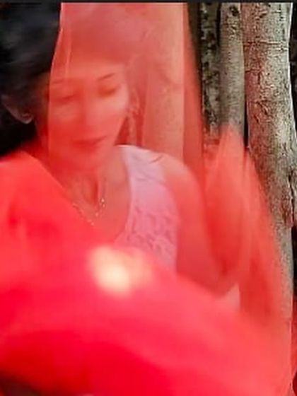 A blurry, artistic shot in red, paired with a Kahlil Gibran quote. This captures the connection between poetry, nature, and my life as a dancer.