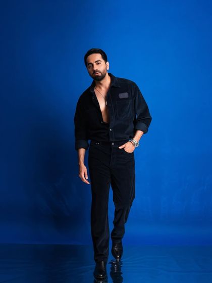 A walking shot that creates a sense of movement and dynamism, perfect for a fashion editorial.