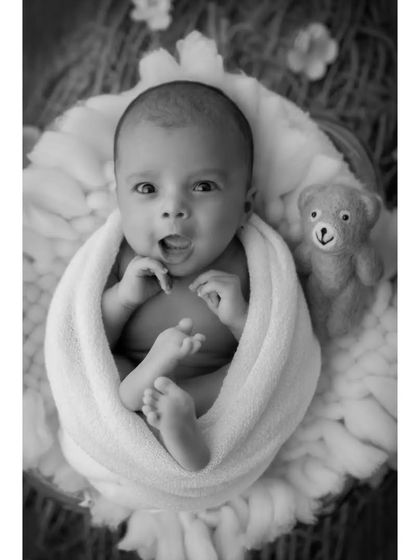 A black and white version of the "Hello World" shot. Stripping away the color focuses our attention on the baby's wide-eyed expression and joyful energy.