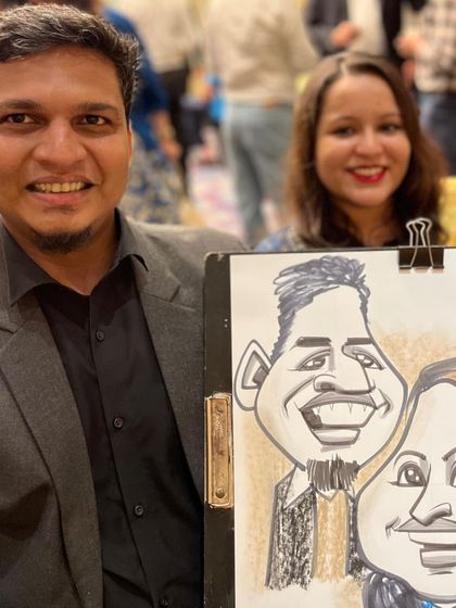 A couple enjoying the event at the Sheraton and their new shared portrait.