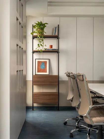 A duplicate of image 32, providing another look at the functional and aesthetic balance in the conference room design.