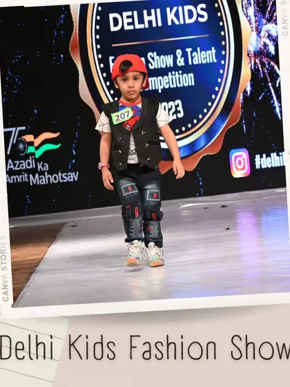 This little guy shows off his cool street style with a backwards cap, vest, and stylish jeans. It proves that having "swag" comes in all shapes and sizes.