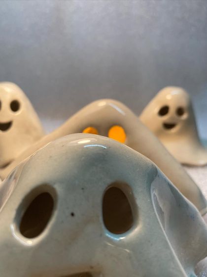 A close-up view of a ghost tea light holder. The simplicity of the shape is what makes them so charming.