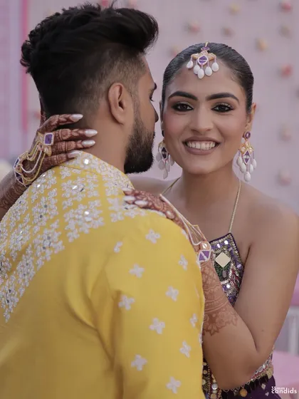 A beautiful couple portrait from the Mehendi ceremony, with the bride's long, simple braid adding to the traditional feel of the event.