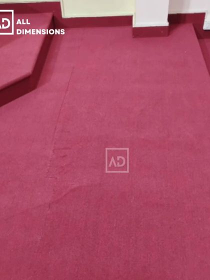 A view of the carpet fitted around steps and corners. I take care to ensure there are no loose edges, making the installation safe and long-lasting.