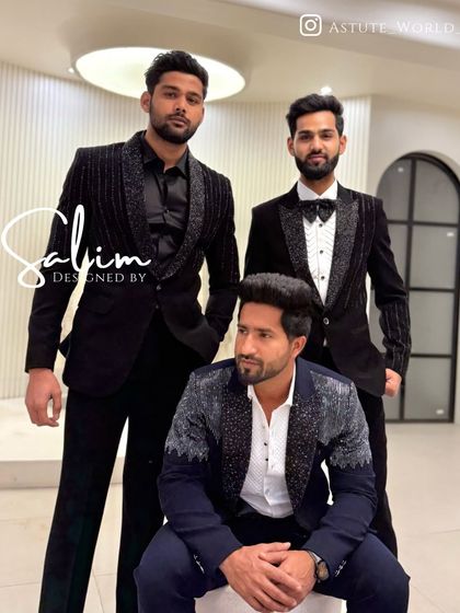 Three clients posing in my studio, each wearing a different style of embellished tuxedo. It's a great showcase of how I can cater to different personalities within a single group.