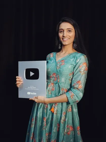 A proud moment for our co-founder Hasti, holding our YouTube Creator Award. This milestone represents years of hard work, passion, and the amazing support from our followers.