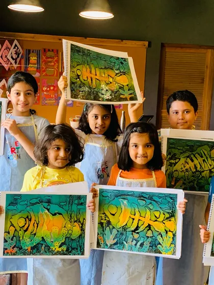 These vibrant fish prints were made using a combination of printmaking and painting techniques.