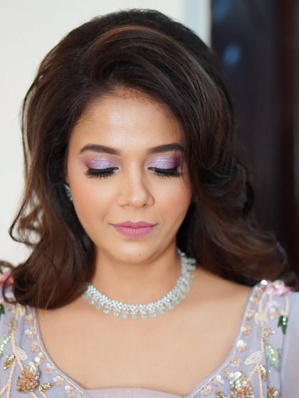 A final look at Nilofar's enchanting engagement makeup. The soft, shimmery lilac eyes and flawless skin create a look that is both modern and timeless.