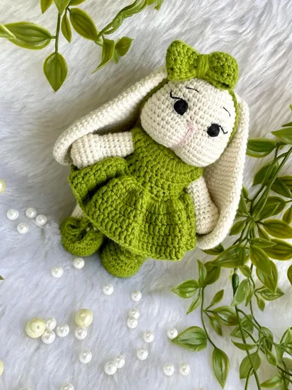 Look at this adorable bunny with her long, floppy ears and sweet green dress! I love when customers have unique ideas, and this long-eared bunny was a joy to bring to life. She is so soft and posable.