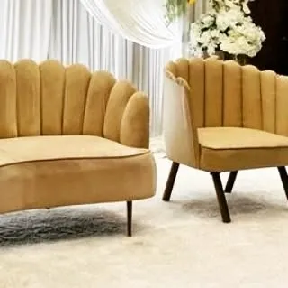 Another view of our curated event furniture, showing the beautiful silhouette and quality of the pieces we use to create comfortable and stylish lounge areas for guests.